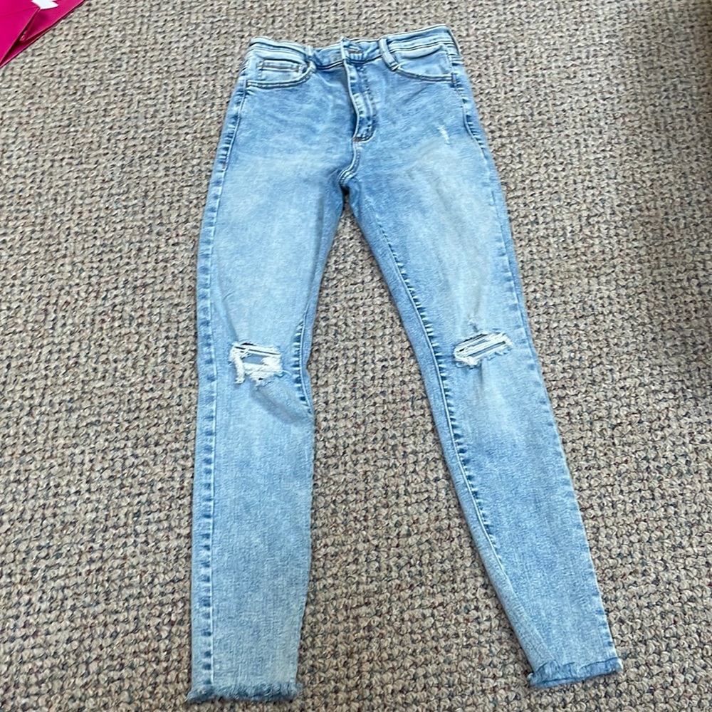 Blue distressed jeans